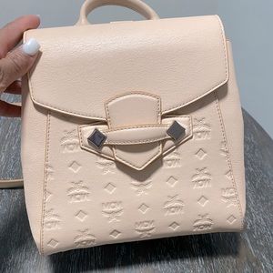 Authentic MCM light pink color backpack purse
